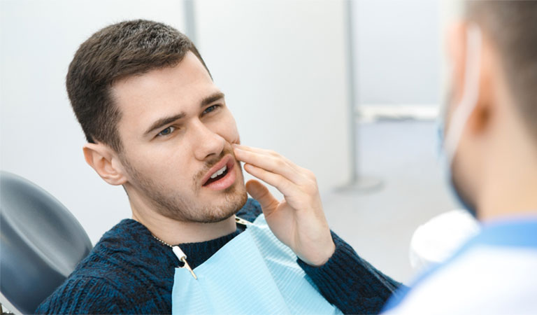 Nhổ răng cấm bị sâu có nguy hiểm không