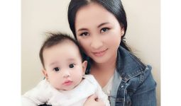 Hình ảnh chị Nhung cùng con gái nhỏ nhiều tháng sau khi chữa khỏi mề đay thai kỳ tại Quân dân 102